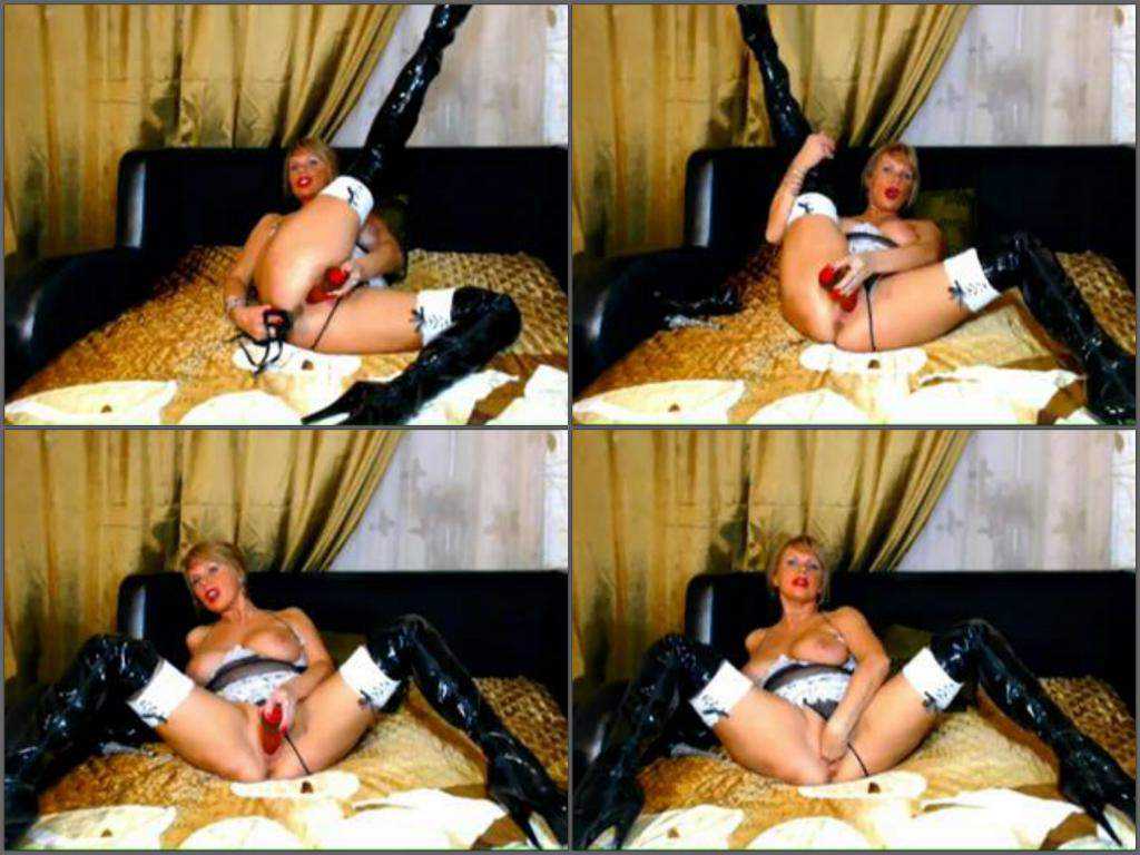 Webcam titted milf wearing long leather boots and fisted